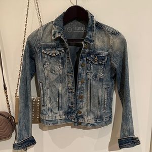 Only distressed Jean jacket